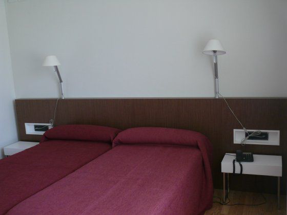 Hotel Los Angeles Guarnizo Quarto foto